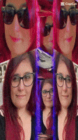 a woman with red hair is wearing sunglasses and a black shirt .