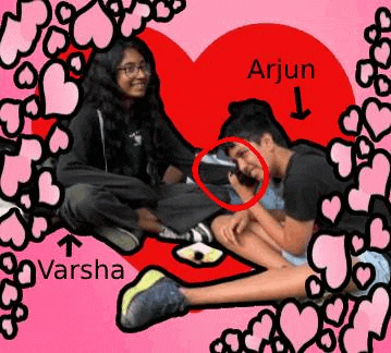 a boy and a girl are sitting next to each other in front of a heart with hearts around them .