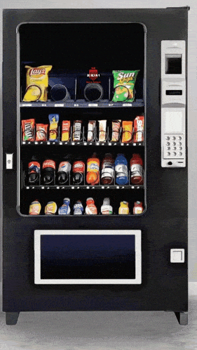 a vending machine with a bag of lays chips in it