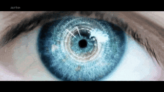 a close up of a person 's blue eye with arte in the corner