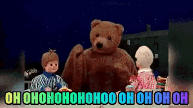 a teddy bear is standing next to a boy and a girl and says oh ohoohoohoo