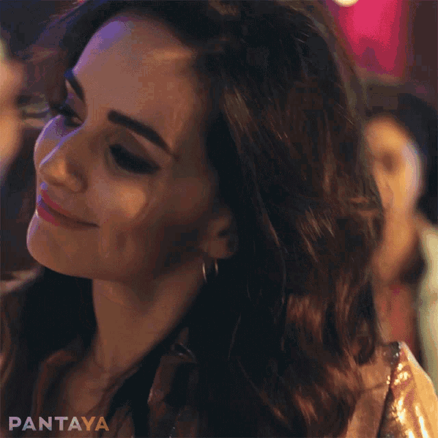 a close up of a woman 's face with the word pantaya on the bottom right