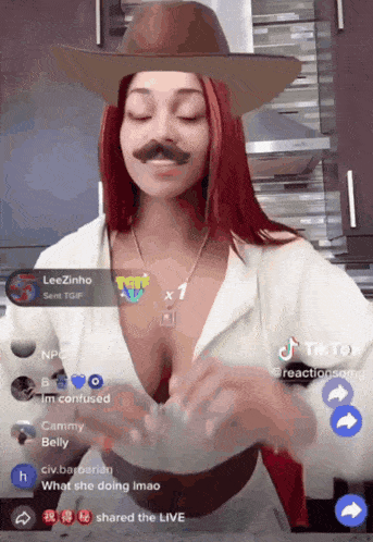 a woman wearing a cowboy hat and a fake mustache is on a tiktok video