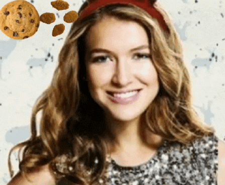 a woman wearing a headband with a cookie on it
