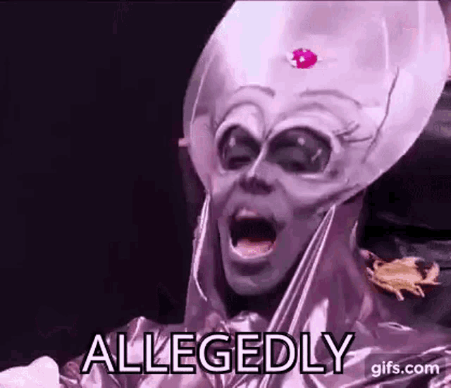 a person in a purple alien costume is making a funny face .