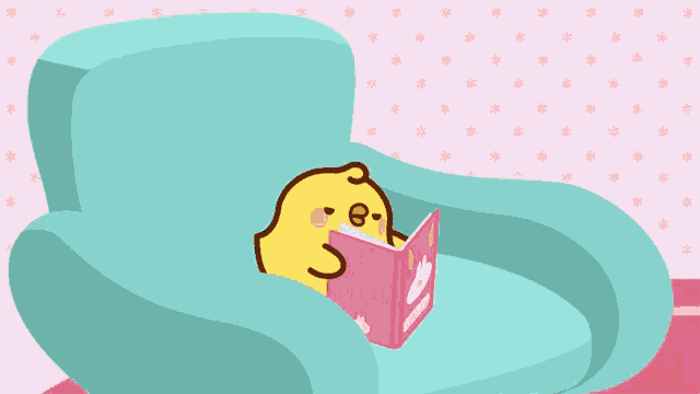 a yellow chicken is reading a book on a blue chair