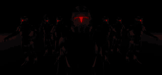 a group of soldiers with red lights on their faces are standing in the dark