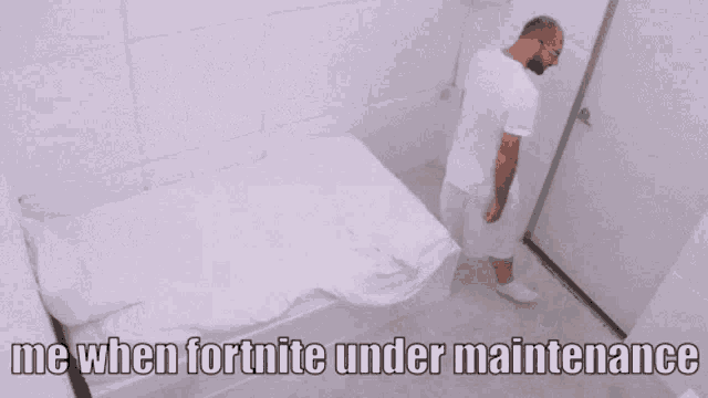 a man in a white robe is standing in a room with the words me when fortnite under maintenance