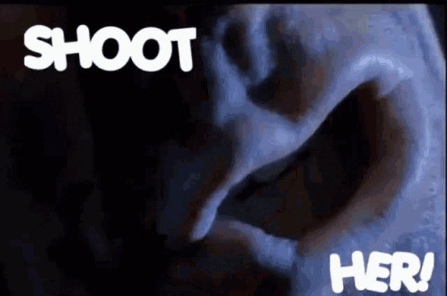 a close up of a person 's face with the words shoot her written above it
