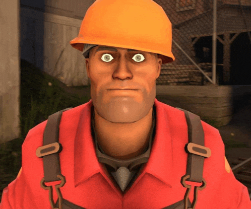 a man wearing a hard hat and a red shirt has a strange look on his face