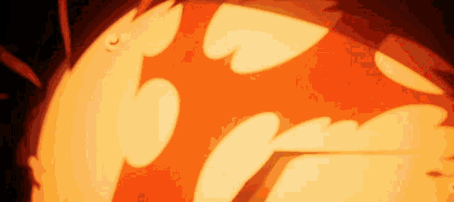 a cartoon drawing of a pumpkin with a flame coming out of it 's mouth .