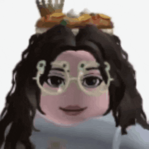 a close up of a doll wearing glasses and a crown .