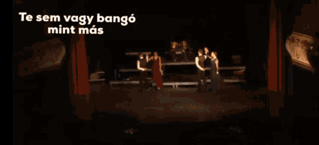 a man and a woman are dancing with the words te sem vagy bango mint mas on the bottom