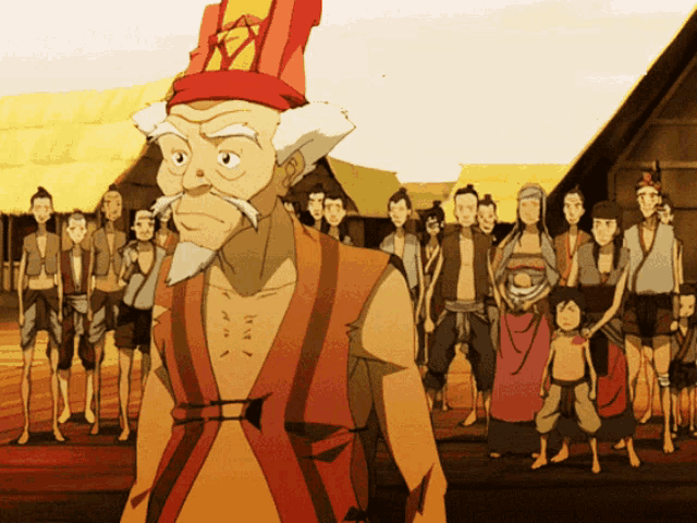 a man with a red hat stands in front of a crowd