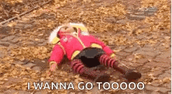 a little girl is laying on the ground covered in leaves and saying `` i wanna go toooo '' .