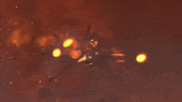 a large explosion is taking place in a dark area