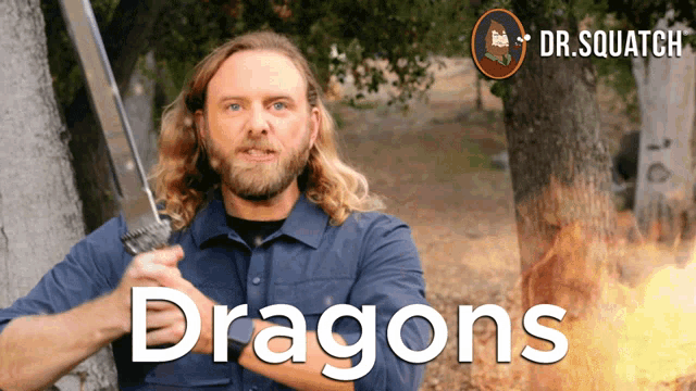 a man holding a sword with the word dragons on the bottom right