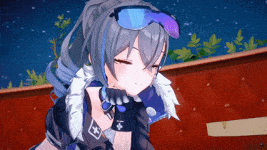 a girl wearing sunglasses and gloves has a cross on her arm