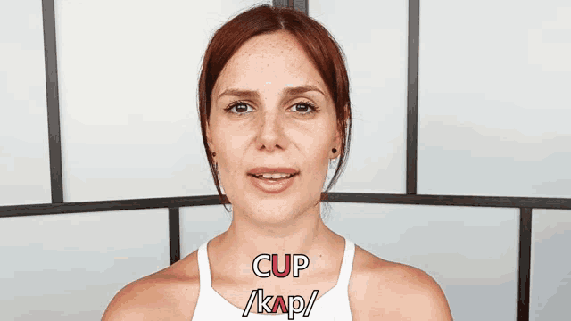 a woman with the word cup on her neck