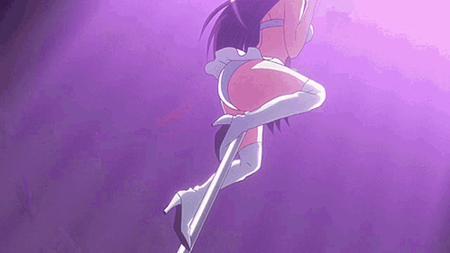 a woman is dancing on a pole in a purple light .