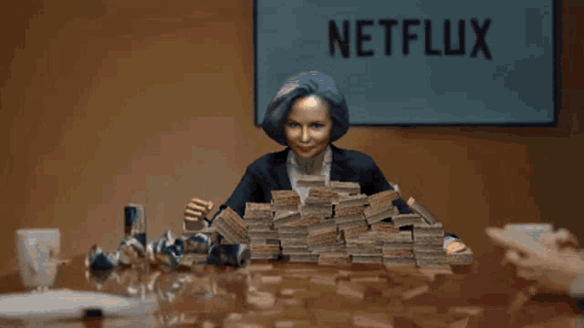a woman sitting at a table with a pile of money and a sign that says netflix