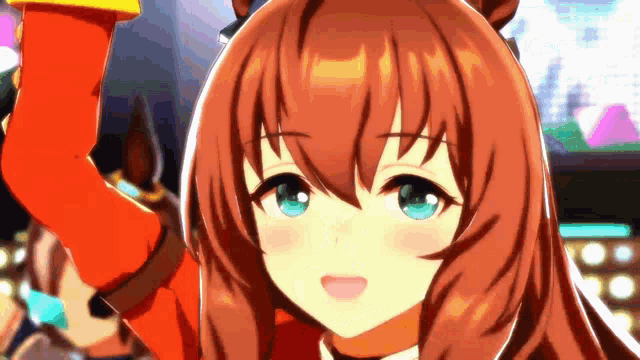 a close up of a girl with brown hair and blue eyes