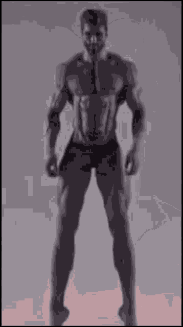 a black and white photo of a muscular man without a shirt