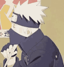 a cartoon character is holding chopsticks in his hand .