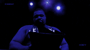 a man in a blue shirt that says le on it