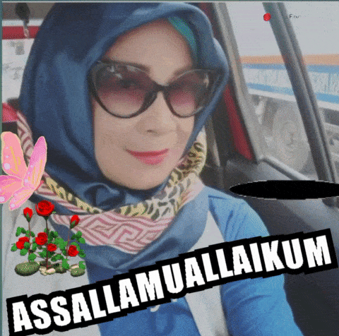 a woman wearing a hijab and sunglasses is sitting in a car with the words assallamuallaikum on the bottom