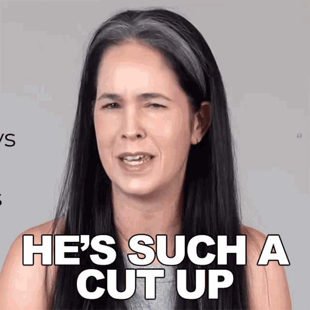 a woman says he 's such a cut up while making a funny face