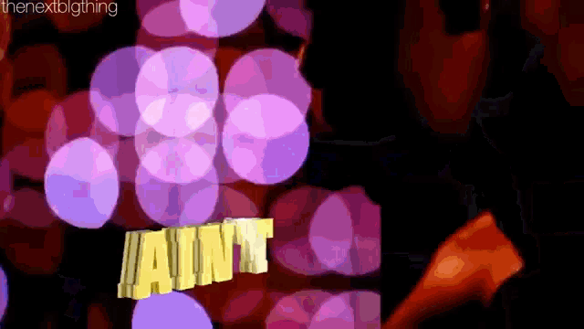 the word ain 't is surrounded by purple and red lights