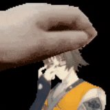 a hand is holding a piece of paper over a person 's head