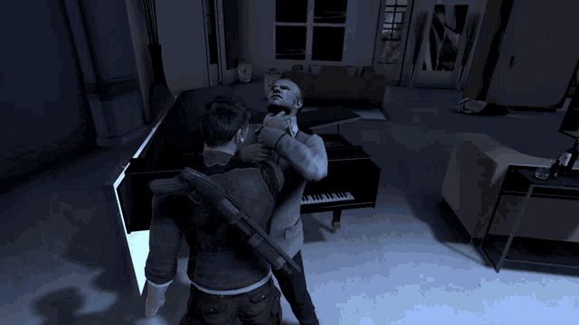a man is playing a piano while another man watches