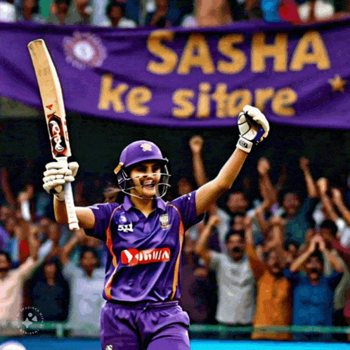 a female cricket player in front of a sasha ke sitore banner