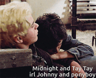 a couple of men hugging each other with the words midnight and tay on the bottom