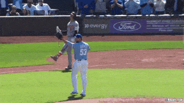a baseball player with the number 53 on his back