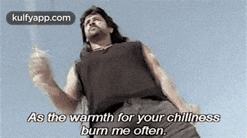a man is smoking a cigarette and saying `` as the warmth for your chillness burn me often . ''
