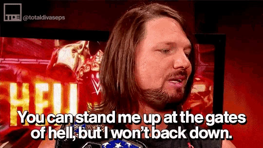 a man with long hair and a beard is saying you can stand me up at the gates of hell but i won 't back down