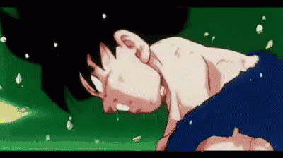a close up of a cartoon character laying down with his head down .