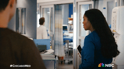a nbc ad for chicagomed shows a man and a woman talking