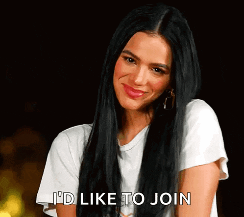 a woman with long dark hair is smiling and says i 'd like to join