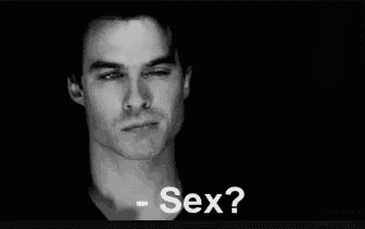 a black and white photo of a man with the words sex on the bottom right
