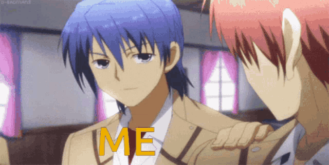 a boy with blue hair is being comforted by another boy