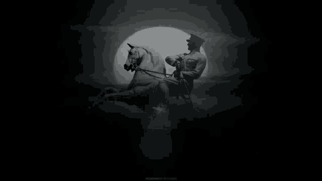 a black and white photo of a man riding a horse with lightning behind him