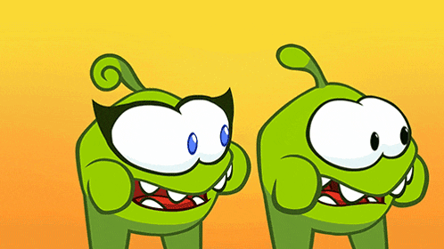 two green cartoon characters with big eyes and sharp teeth