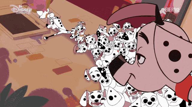 a bunch of dalmatian dogs are on a disney channel ad