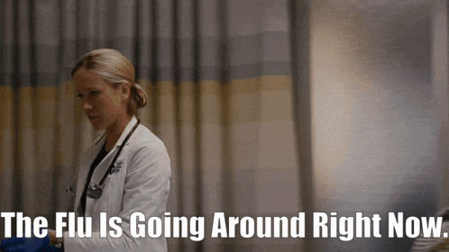 a doctor in a hospital room with the words " the flu is going around right now " above her