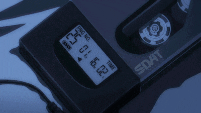 a black device that says dat on the bottom of it