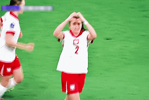 a female soccer player with the number 2 on her shirt